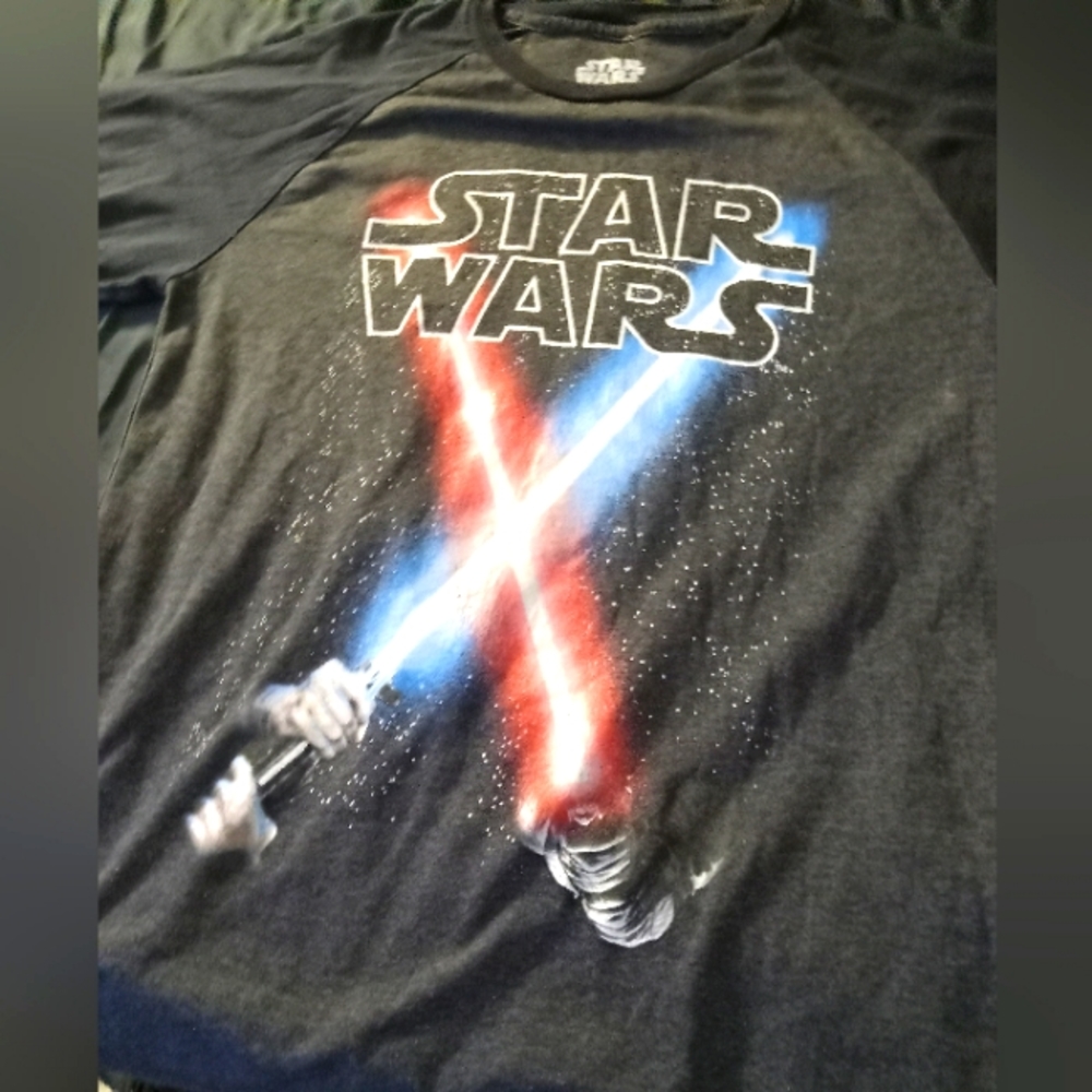 Starters shirt. XL but fits as a Med. Long sleves